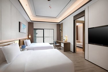 One bedroom Suite One King and One Queen with Mountain View