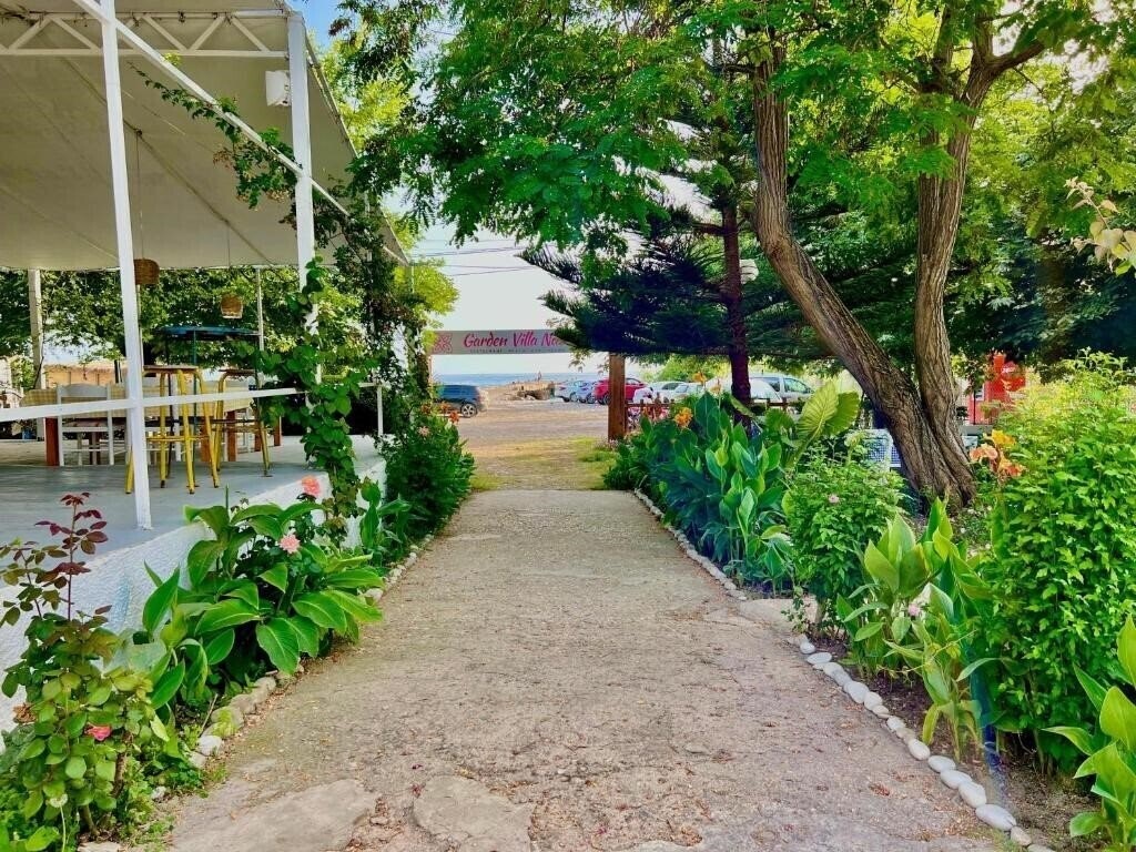 Фото Garden Villa Naza Apt апартаменты