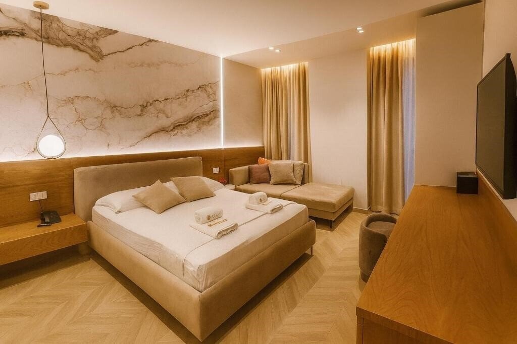 Фотография Hotel Memmaj 4*