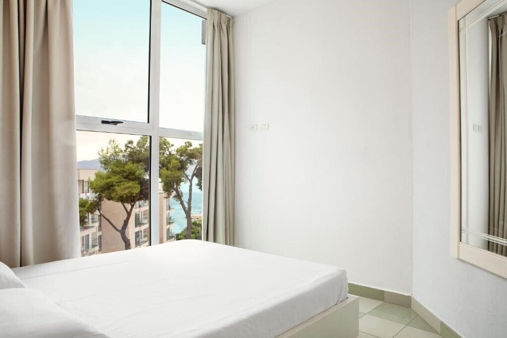 Готель Portafortuna Apartments 3*