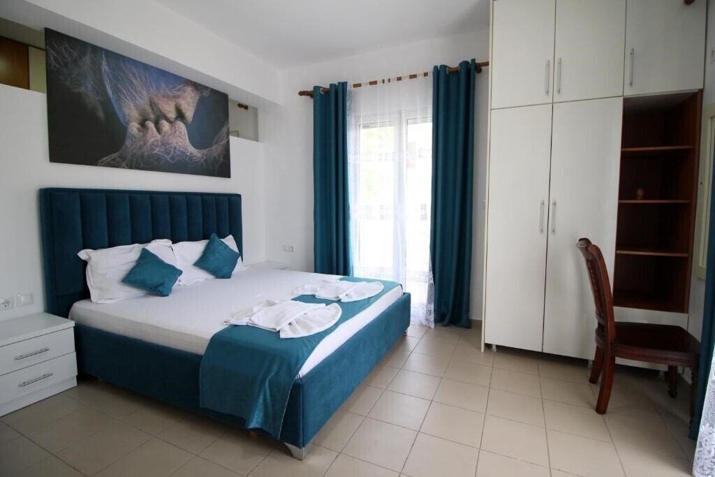 Отель Kapllani Apartments апартаменты