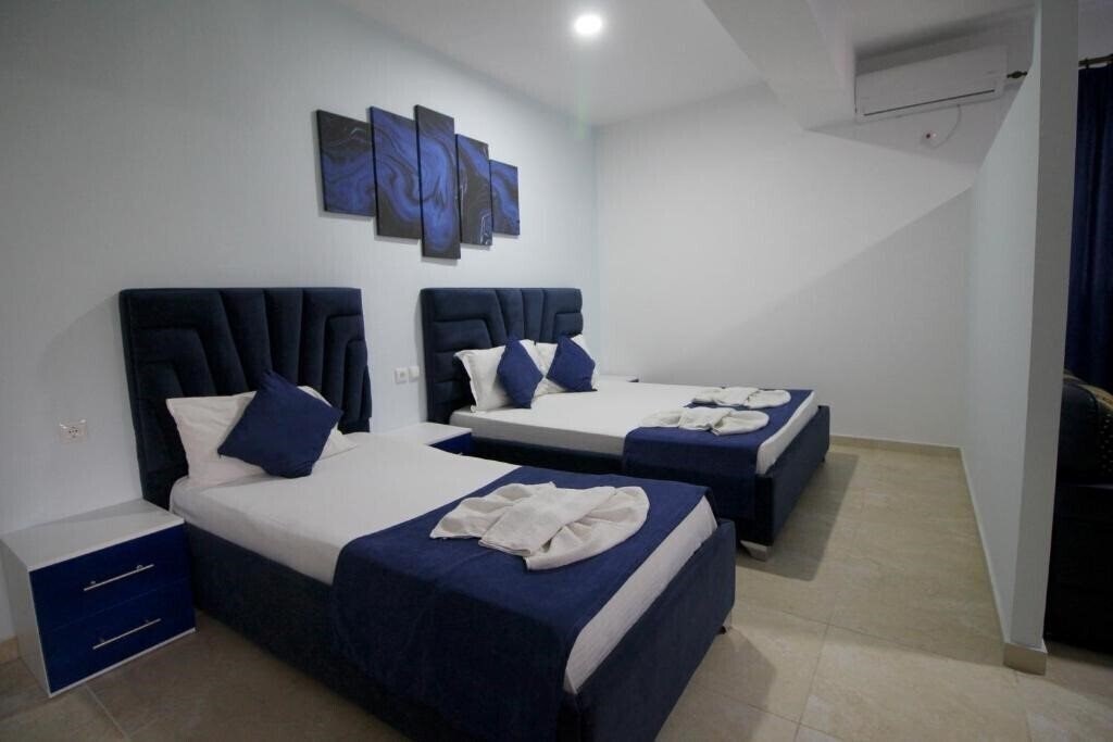 Фото Kapllani Apartments апартаменты