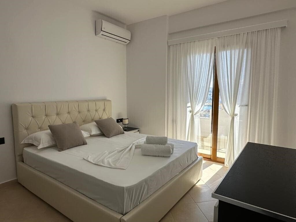 Готель Rama Apartments апартаменты