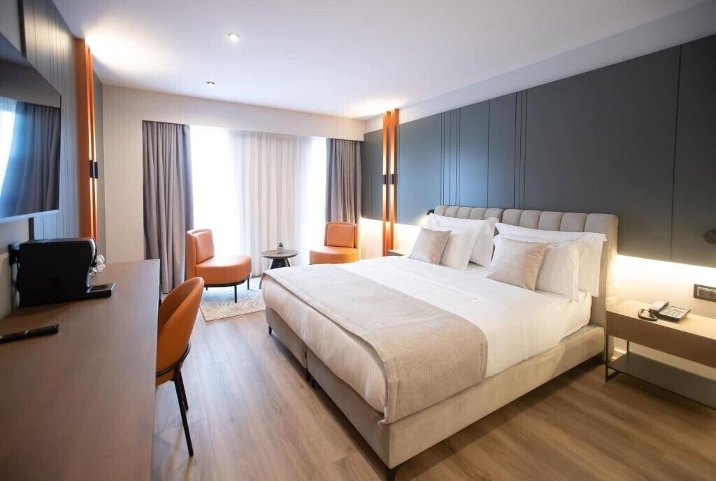 Фотографія Hotel Elisa Tirana Affiliated By Melia 4*