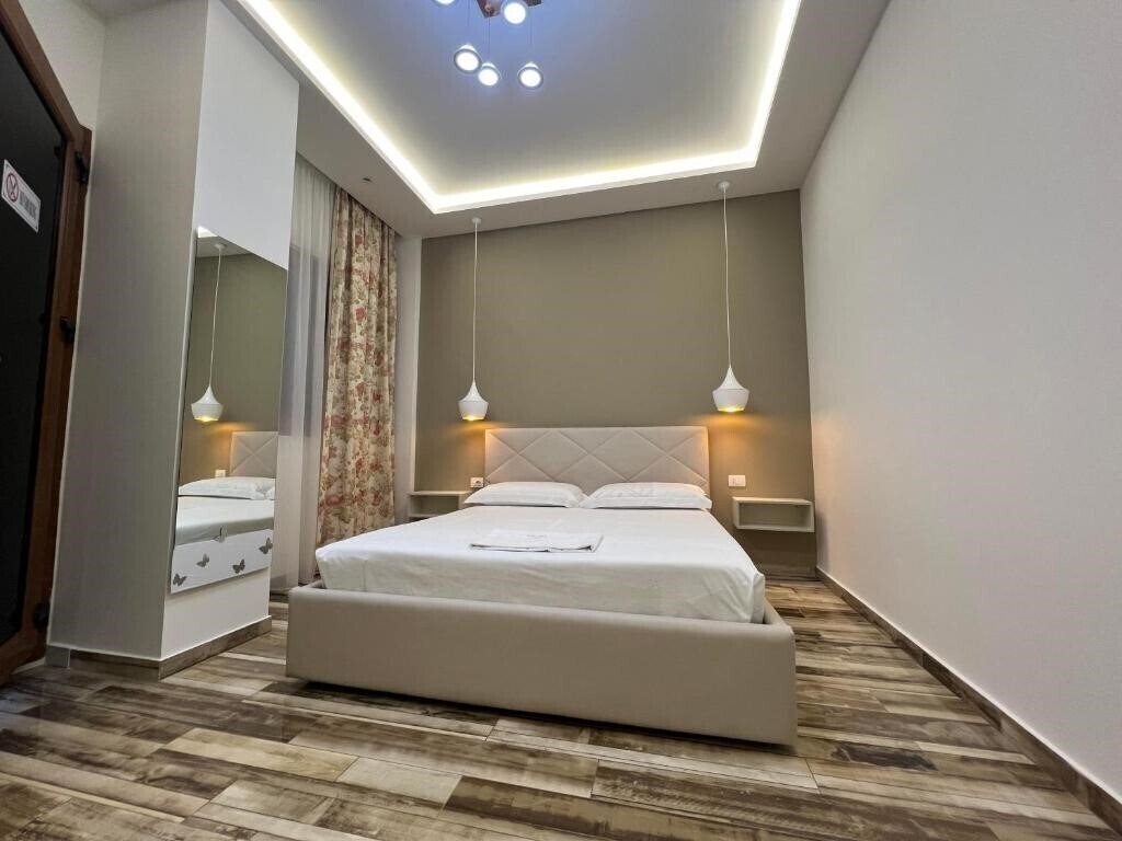 Фотографія Guest Rooms Angolo Toscano 2*