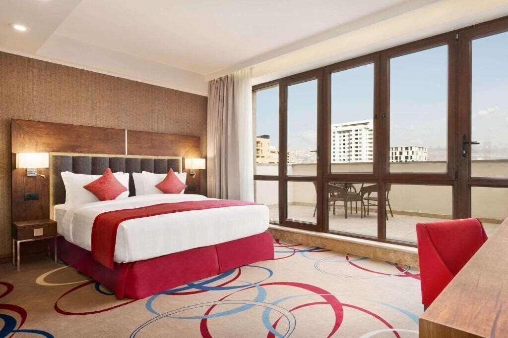 Фото Ramada By Wyndham Hotel & Suites Yerevan 4*