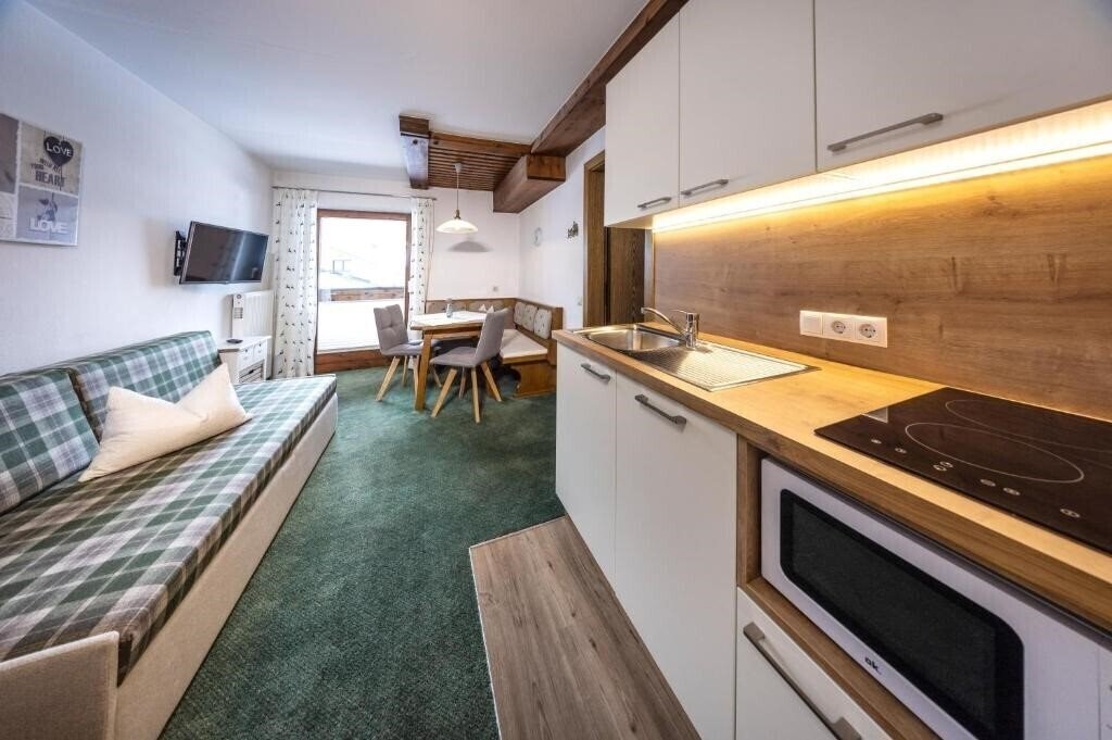 Фотографія Appartements Haus Austria Apt 1*