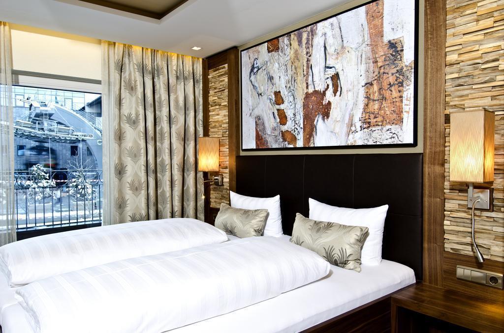 Фотографія Garni Astoria 4*