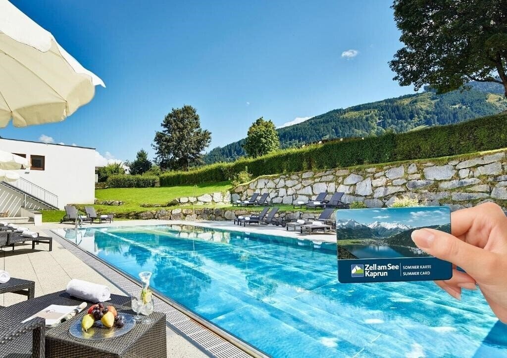 Фотографія Das Alpenhaus Kaprun Hotel 4*