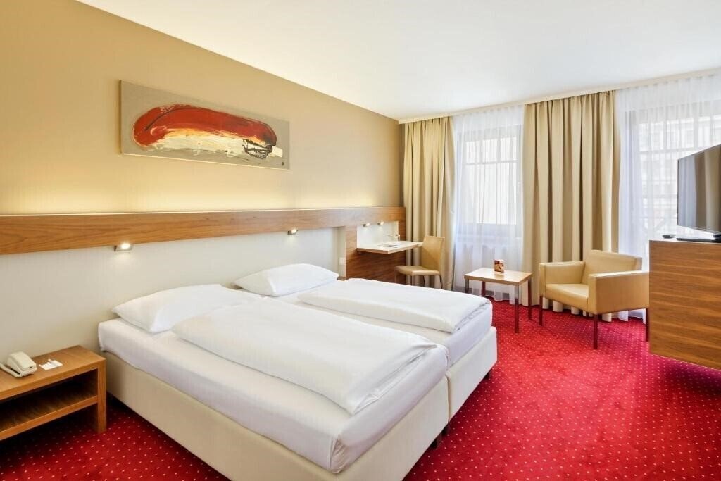 Отель Austria Trend Hotel Anatol 4*