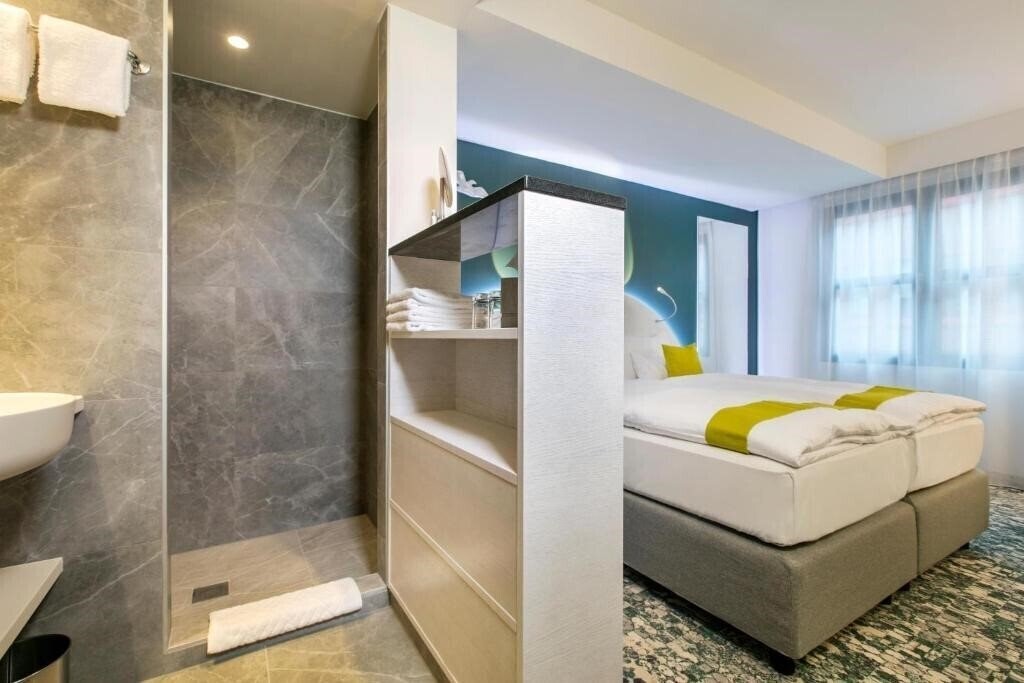 Фотографія Arcotel Donauzentrum Wien 4*