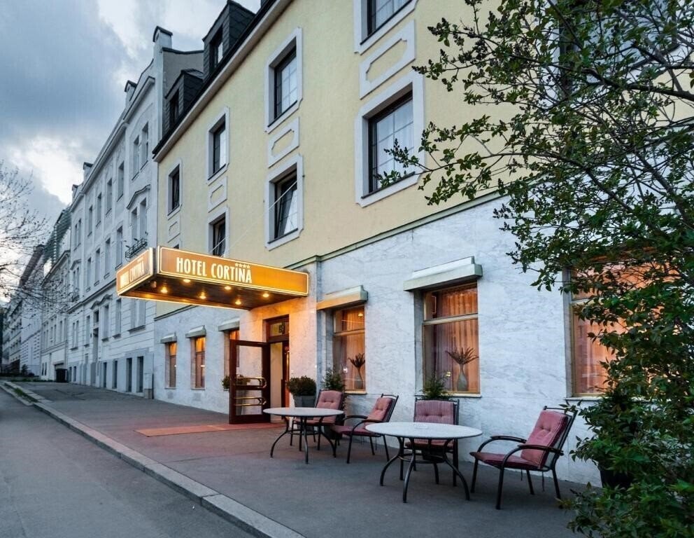 Отель Club Hotel Cortina 4*