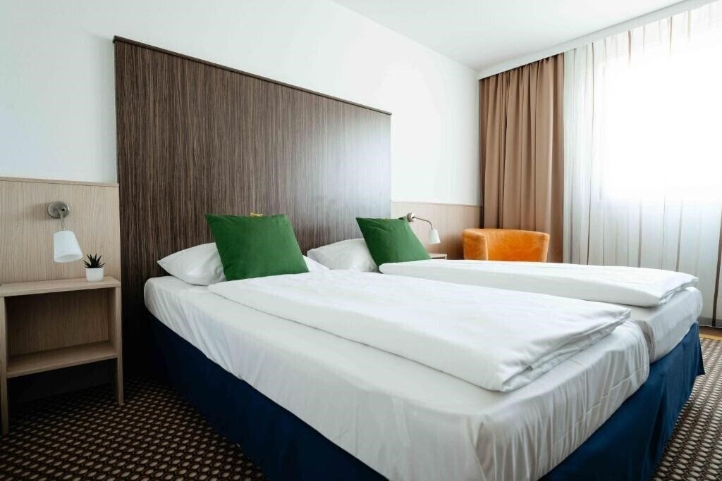 Фото Sleeep Hotel Vosendorf 4*