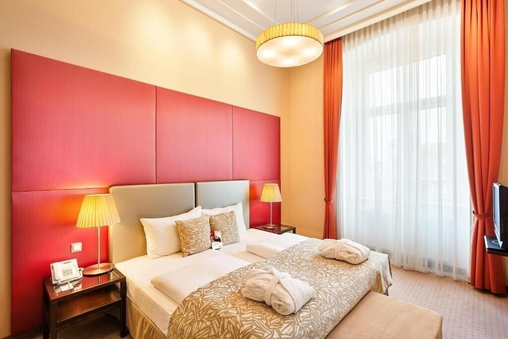 Фотографія Austria Trend Hotel Savoyen 4*