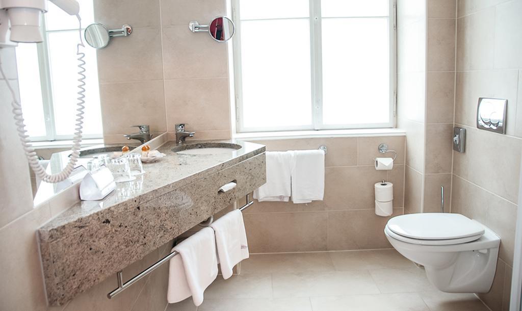 Фото Opera Suites Hotel 4*