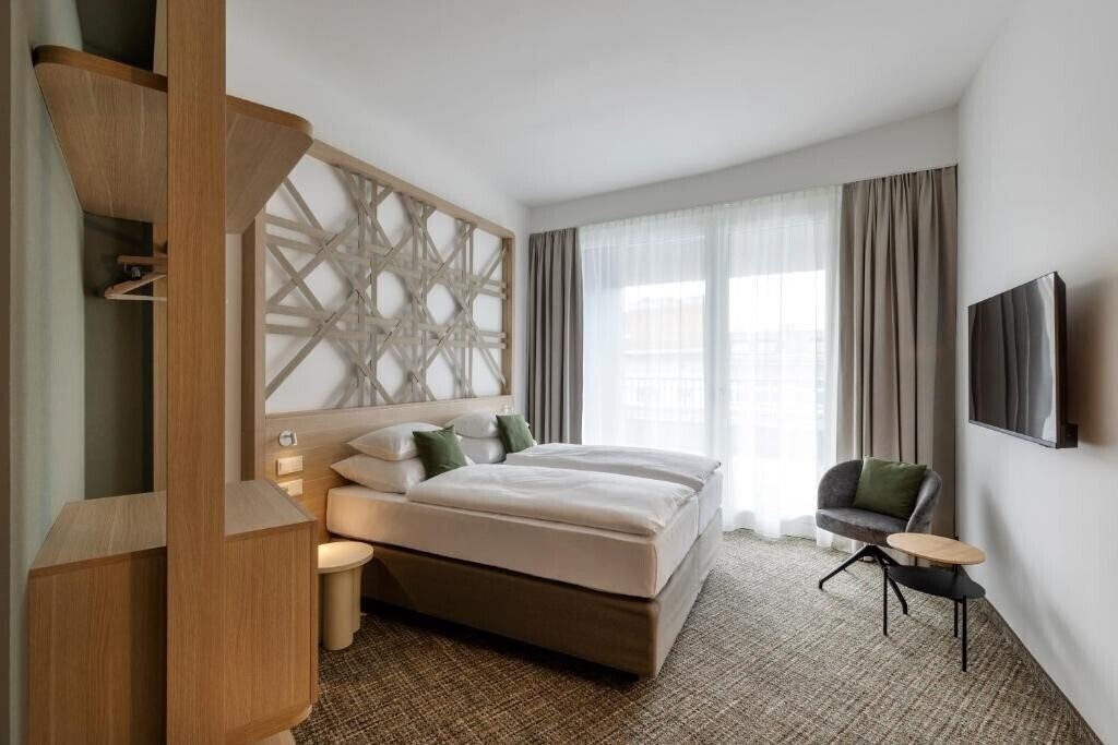 Фото Arcotel AQ Wien 4*