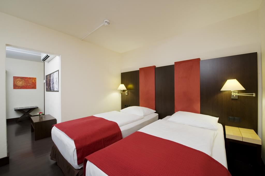 Фотографія NH Salzburg-City 4*