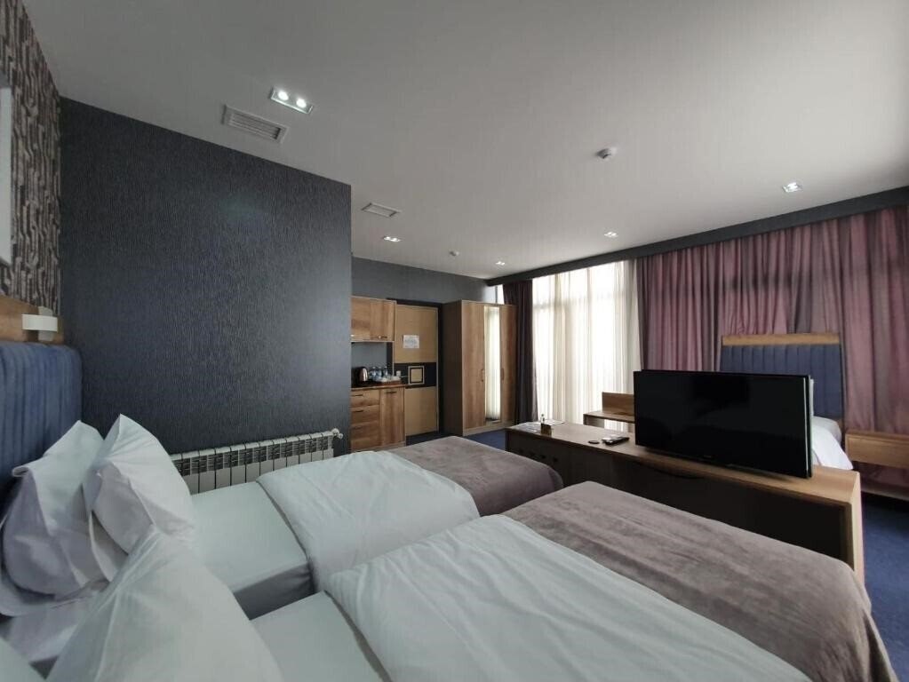 Фото Home Suites Baku Hotel 4*