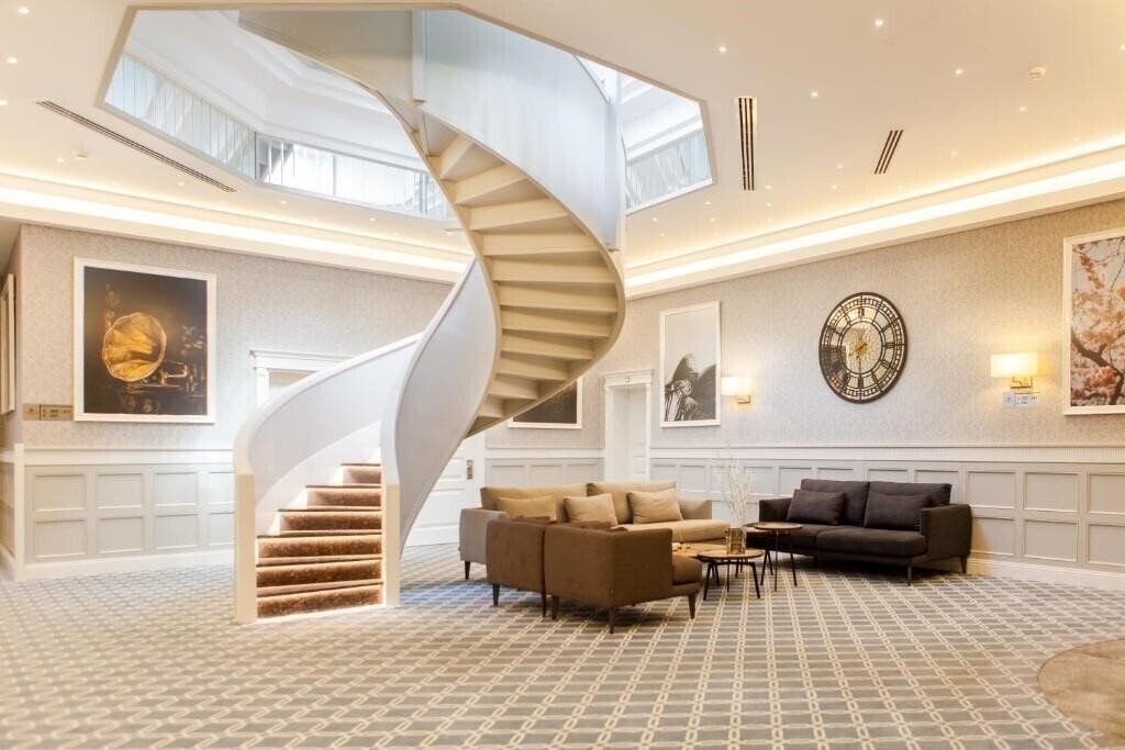 Отель Promenade Hotel 5*
