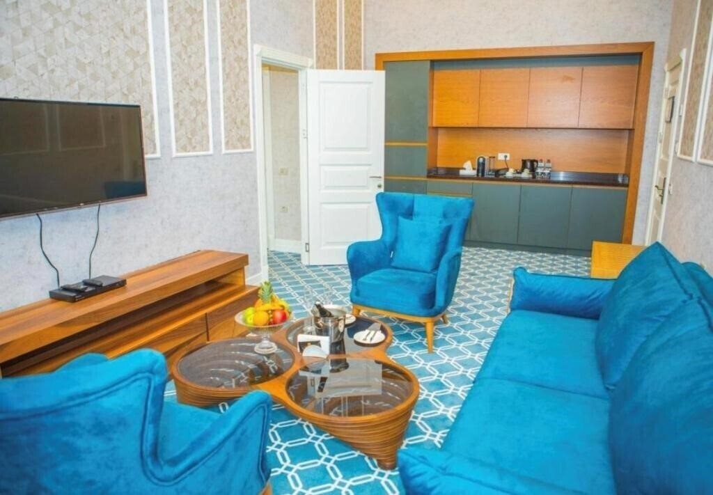Отель Promenade Hotel 5*