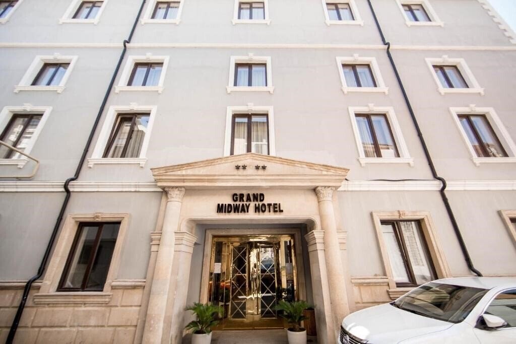 Отель Grand Midway Hotel 4*