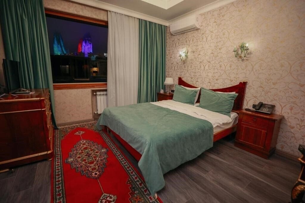 Фотографія West Inn Hotel Baku 4*