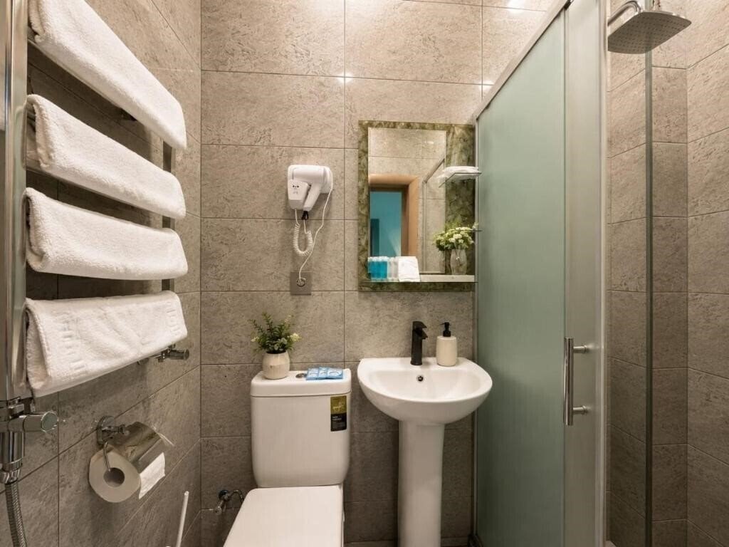 Фотографія Garden Inn Nizami Hotel 3*