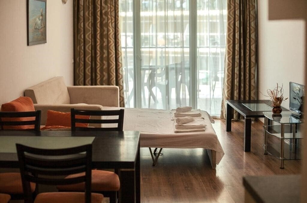Картинка Sunny Holiday Apartments 3*