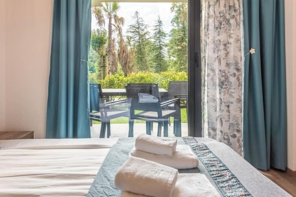 Фото Azur Deluxe Apartments 4*