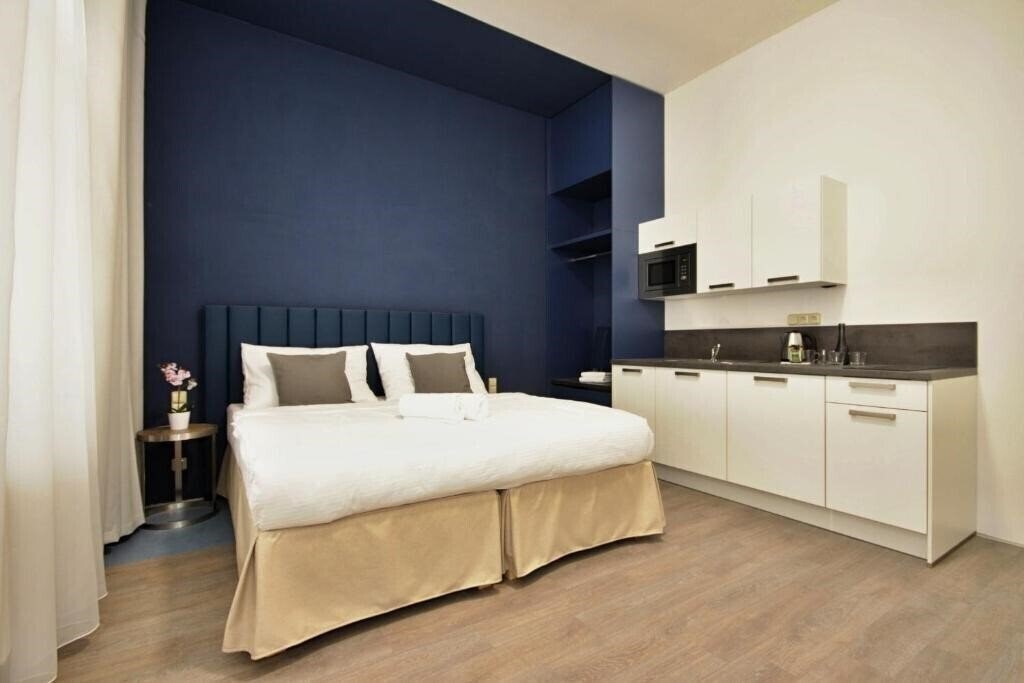 Фотографія Alveo Suites 4*