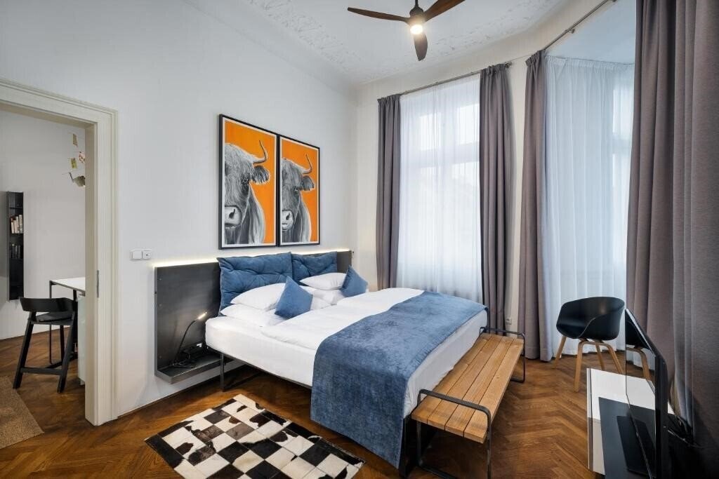 Картинка Mooo Downtown Apartments 4*