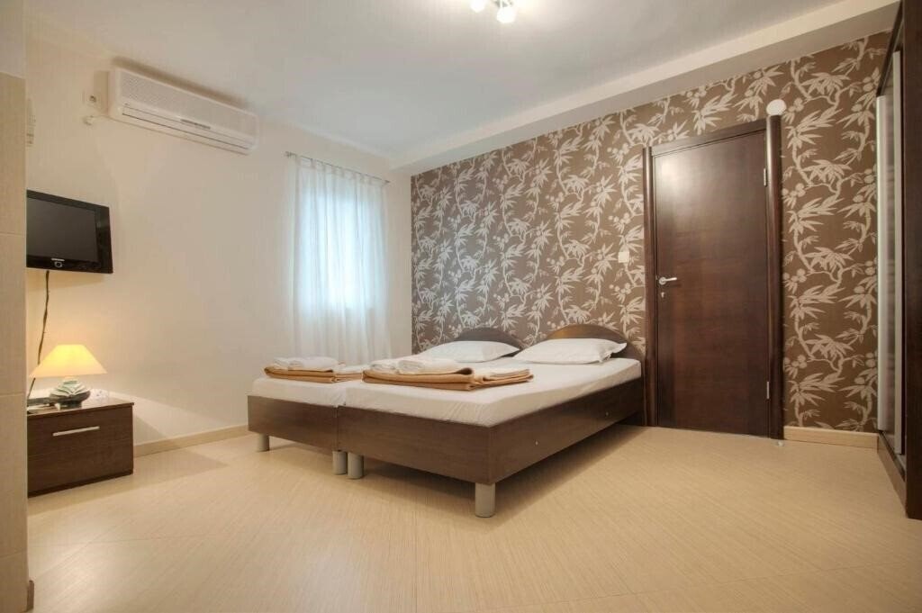 Фотографія Mandir Apartments 3*