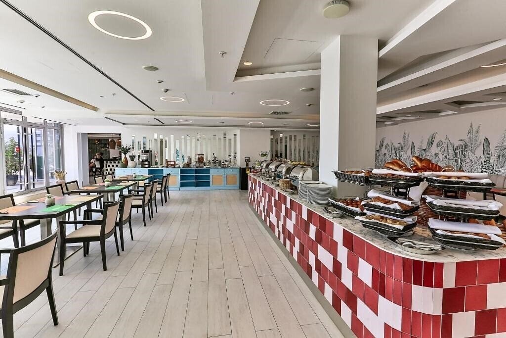 Фотографія Hotel TQ Plaza 4*