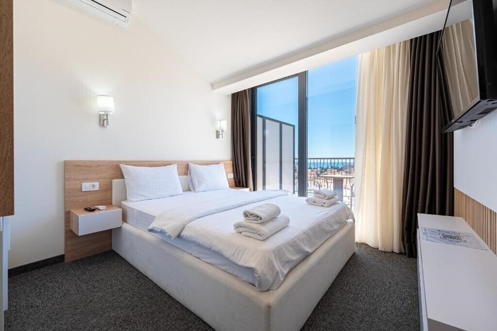 Отель Rooftop Apartments & Rooms 3*
