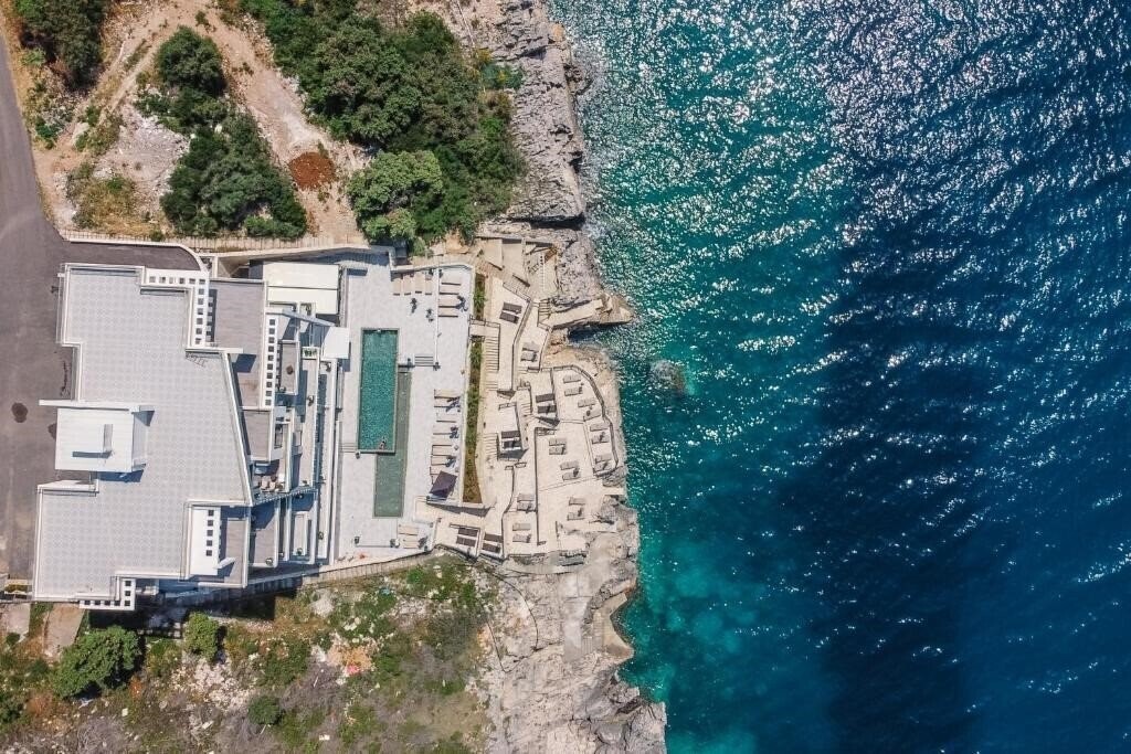 Фотография Dollaku Apartments 4*