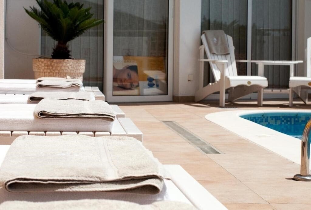 Фотографія Kamelija Apartments 4*