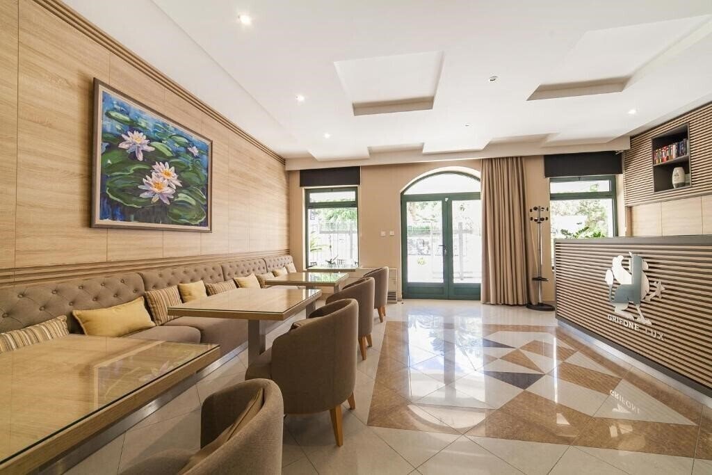 Фотографія Apartments Grifone Lux 4*