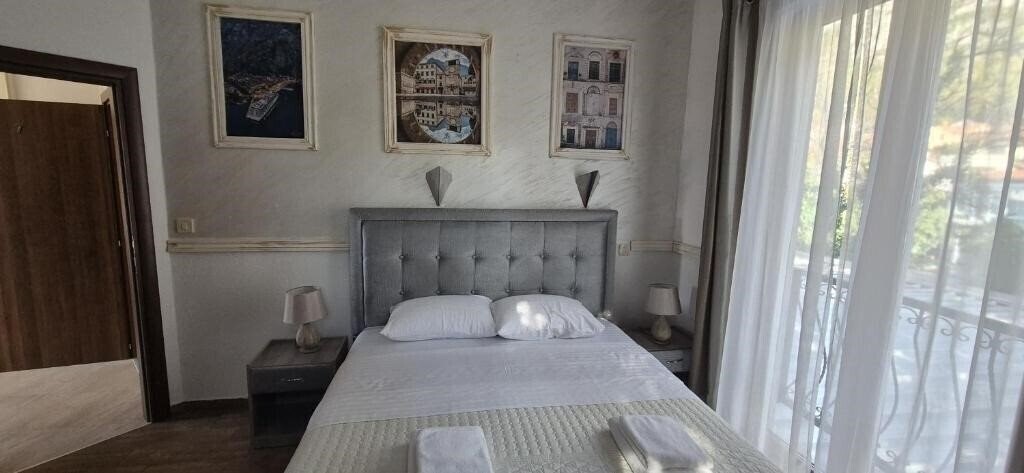 Фотографія Bocche Di Cattaro Apartments 4*