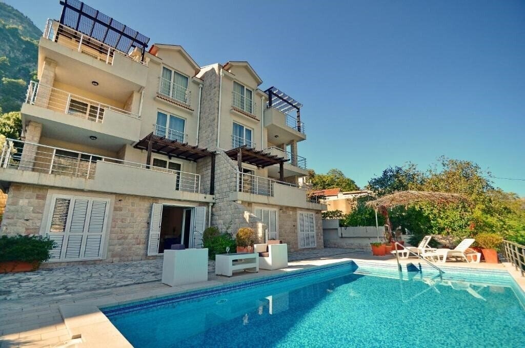 Готель Muo Apartments 4*