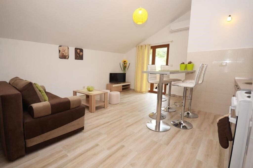 Фотографія Apartmani Mizdrak 4*