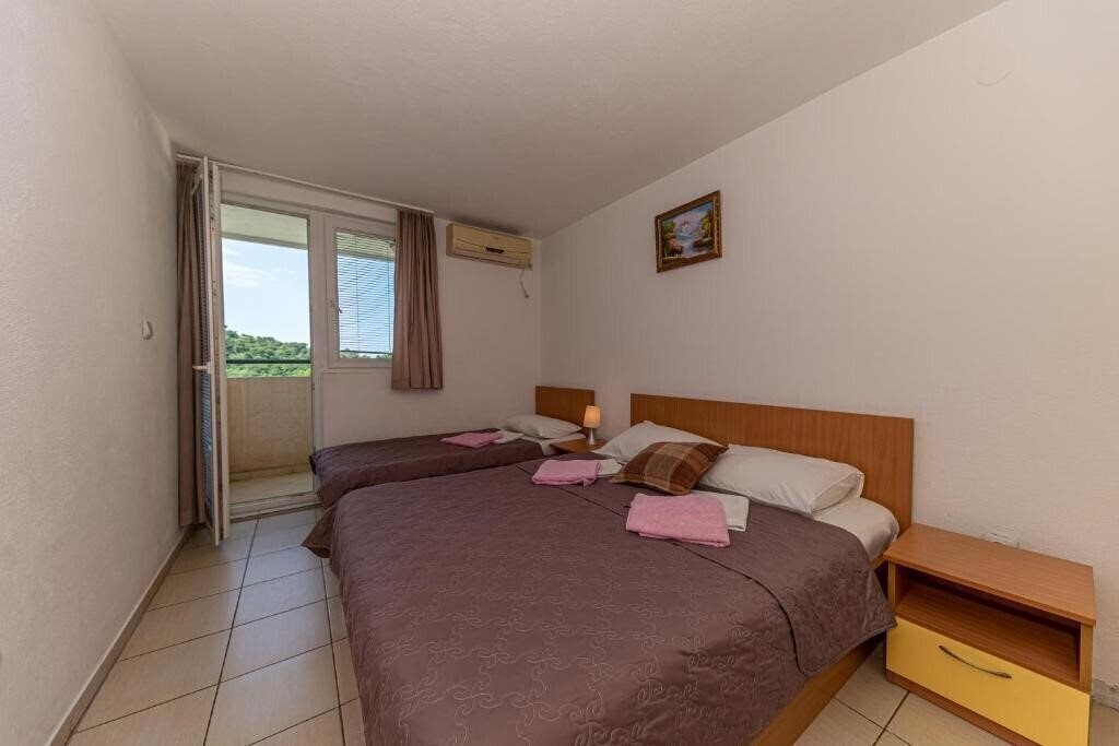 Фотография Apartament Knezevic 4*