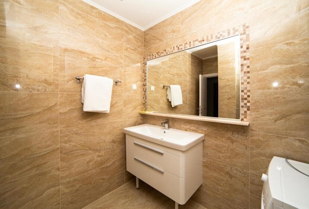 Фотографія Apartments Obala Aura 4*