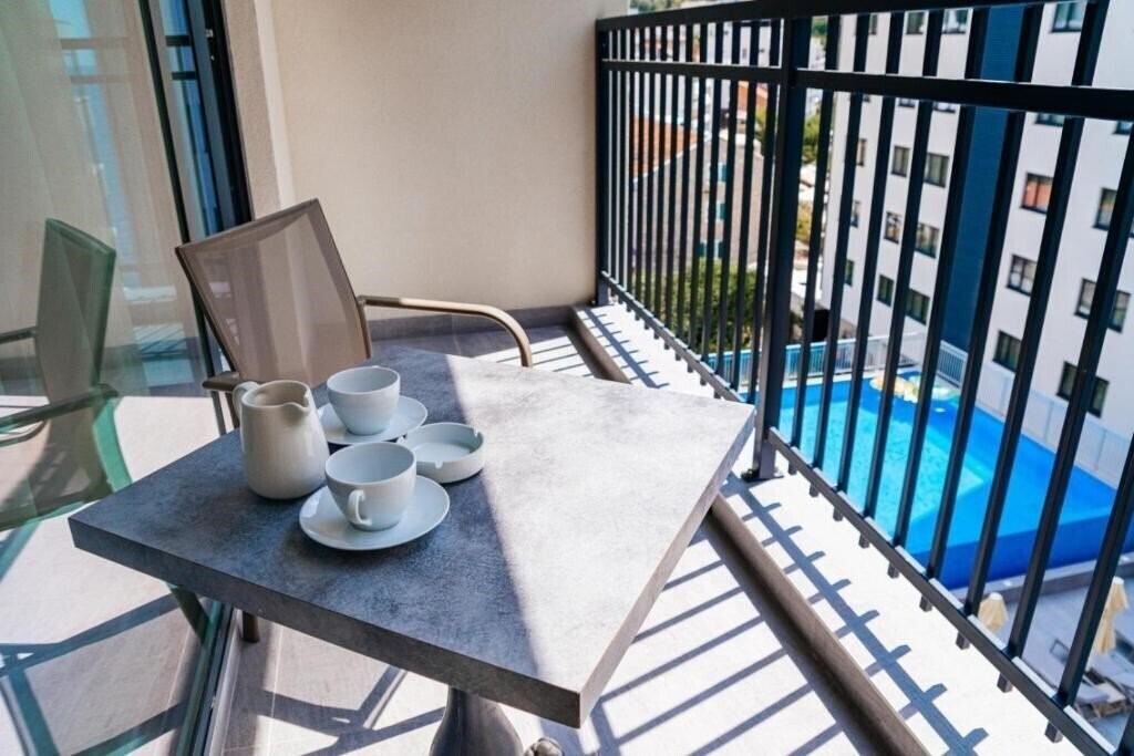 Фотография Sunraf Luxe Apartments 4*