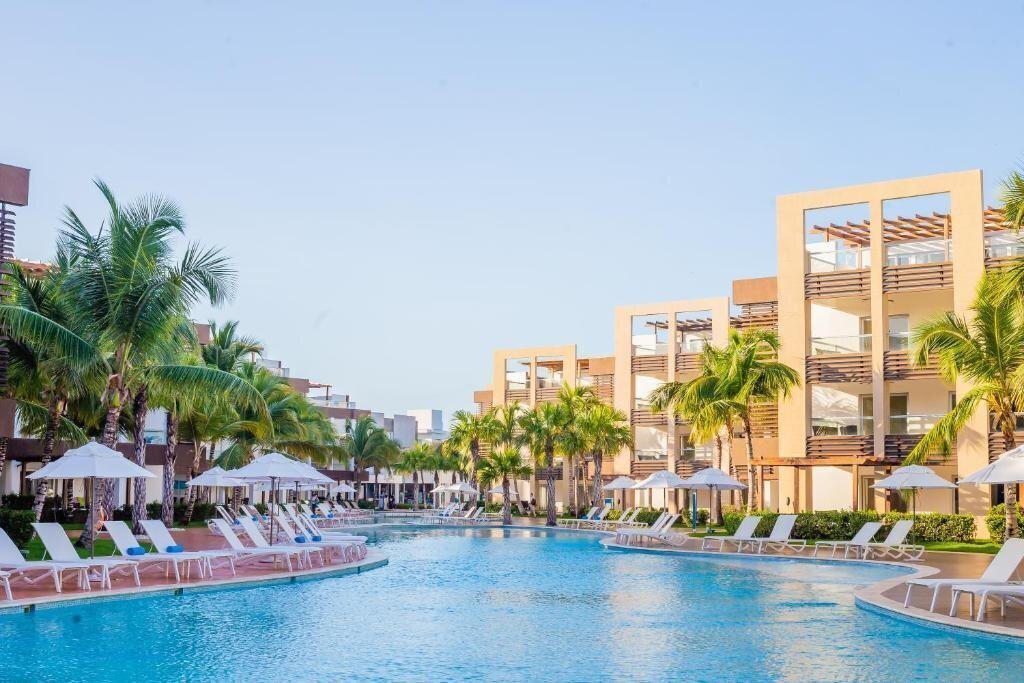 Фото Bakour Punta Cana Suites (ex. Radisson Blu Resort & Residence Punta Cana, Blue Beach Punta Cana Luxury Resorts, Beach Front Luxury Apartment Bluebeach ) 5*