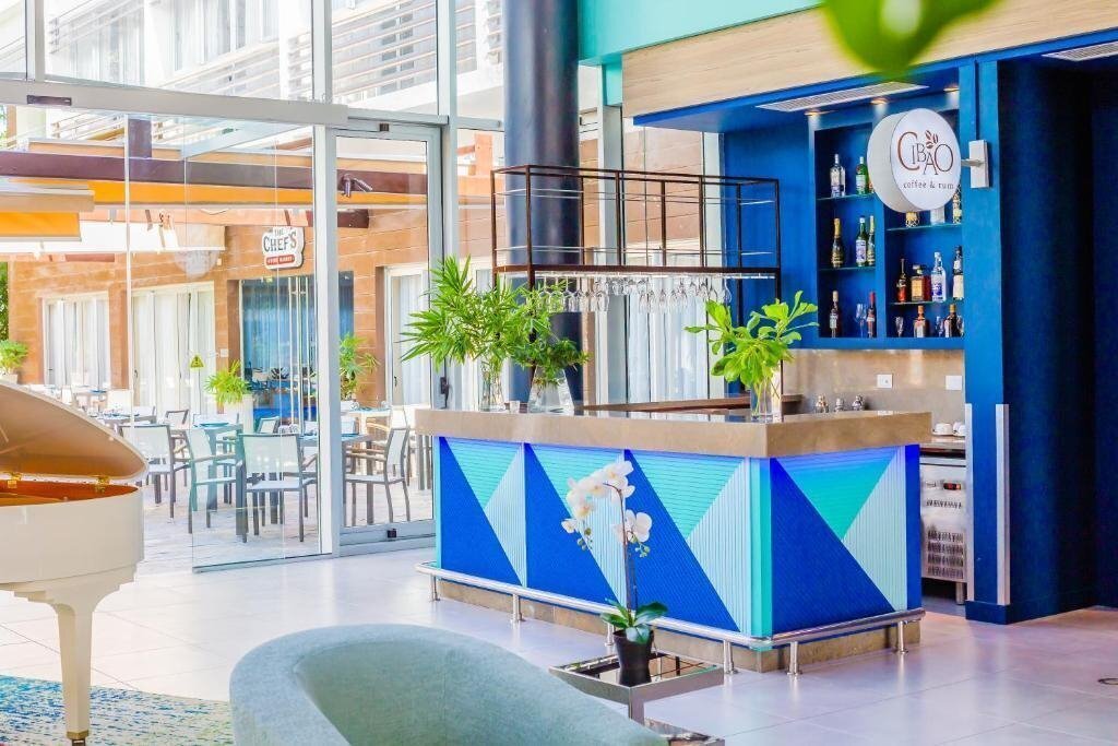 Фотографія Bakour Punta Cana Suites (ex. Radisson Blu Resort & Residence Punta Cana, Blue Beach Punta Cana Luxury Resorts, Beach Front Luxury Apartment Bluebeach ) 5*