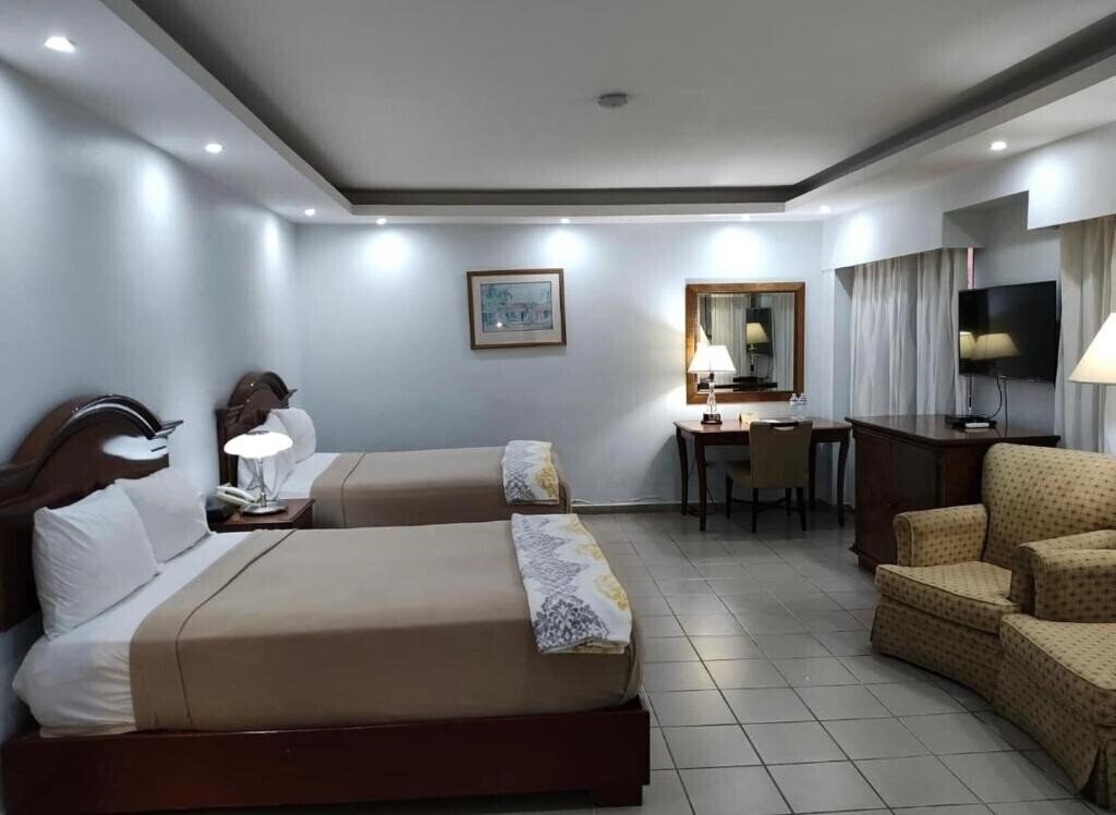 Фотография Micro Hotel Condo Suites + 2*