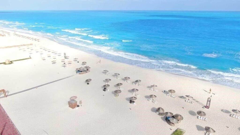 Отель Tolip Hotel North Coast 5*