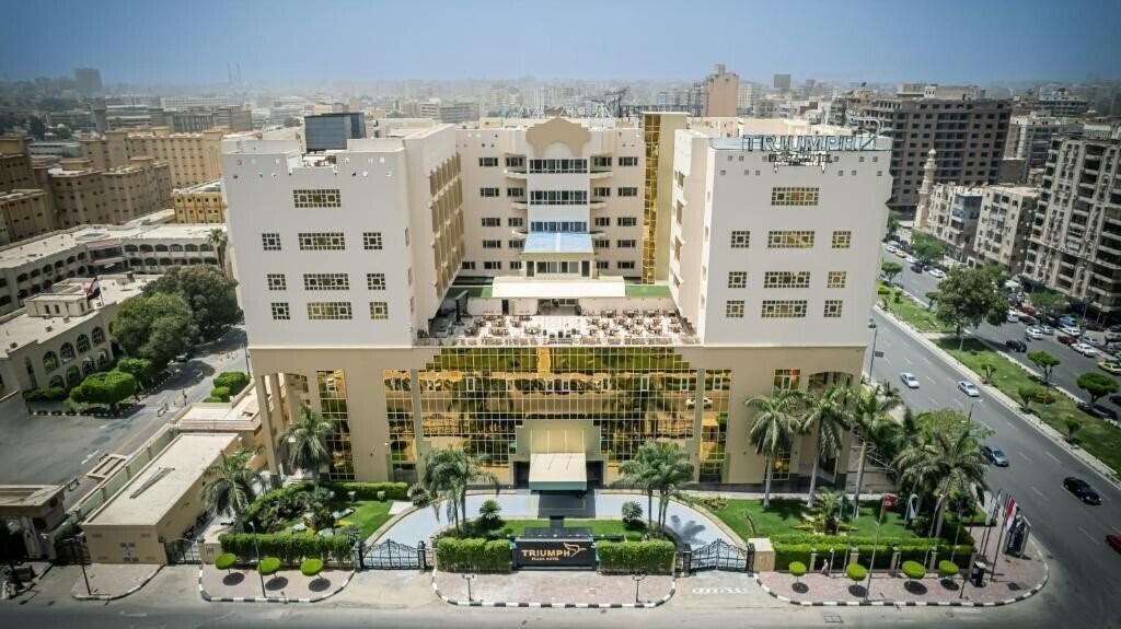 Отель Triumph Plaza Hote 4*