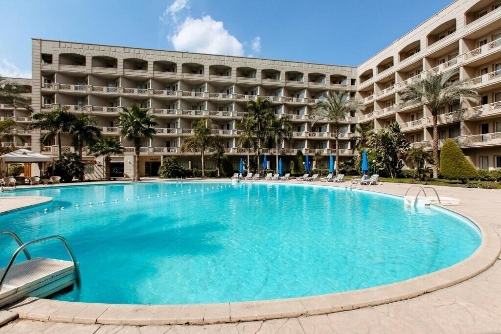 Отель Grand Pyramids 4*