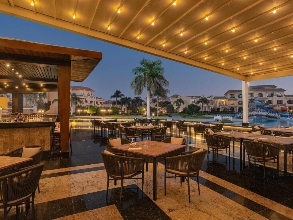 Фотографія Movenpick Hotel & Casino Cairo Media City 5*